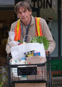 Open Table volunteer with shopping cart