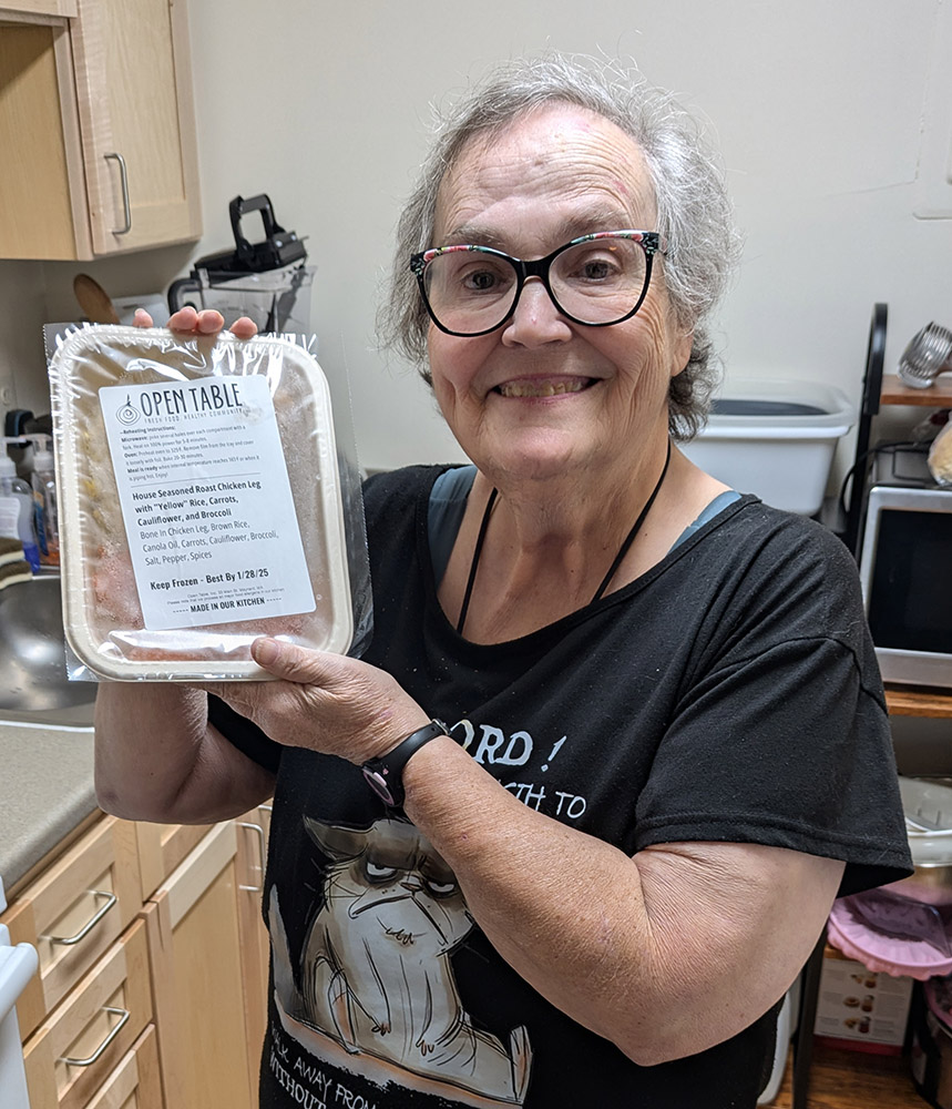 Denise with an Open Table prepared meal